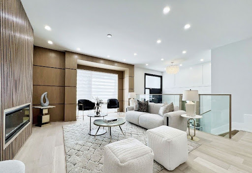 Elegant open-concept living room with clean lines and warm neutral color palette